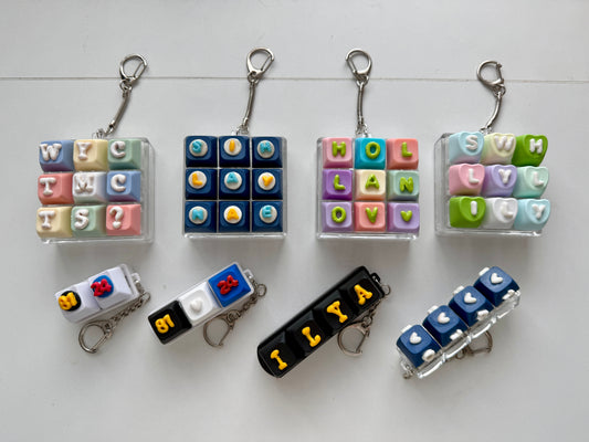 *Heated Rivalry-inspired fidget keychains*