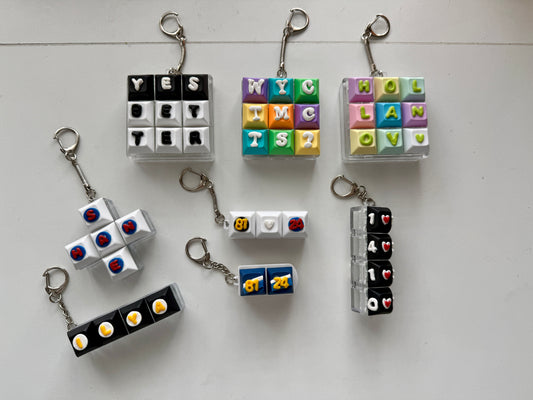 *Heated Rivalry-inspired fidget keychains*